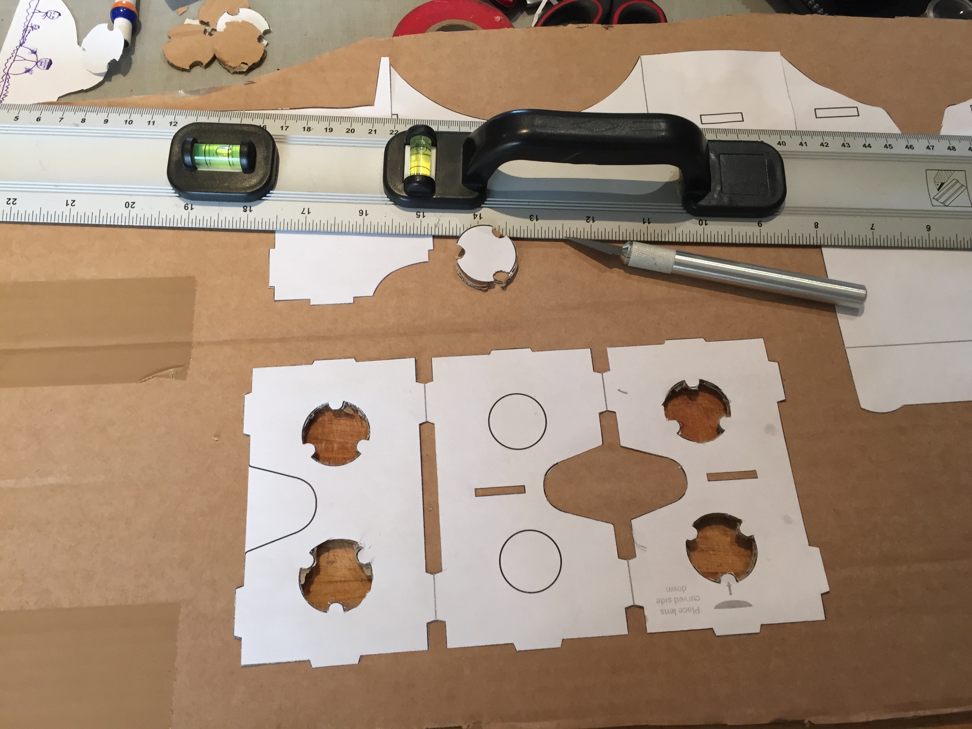 Paper plans glued to cardboard - beginning the cutting out
